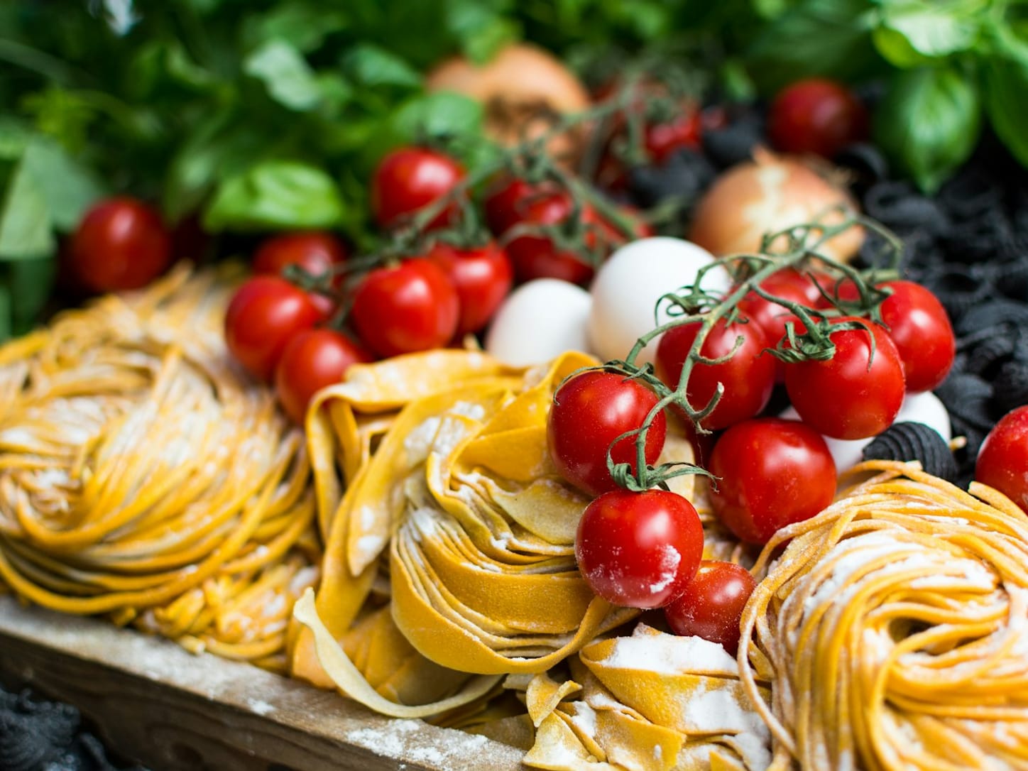 Tossed noodles in house sauce